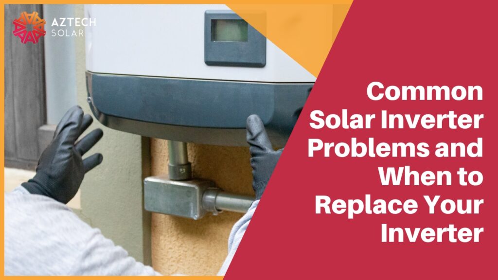 A technician wearing black work gloves inspects a white solar inverter unit mounted on an outdoor wall.