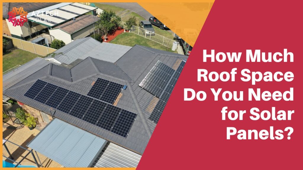 An aerial drone view looking down at residential roof sections with multiple arrays of solar panels installed.